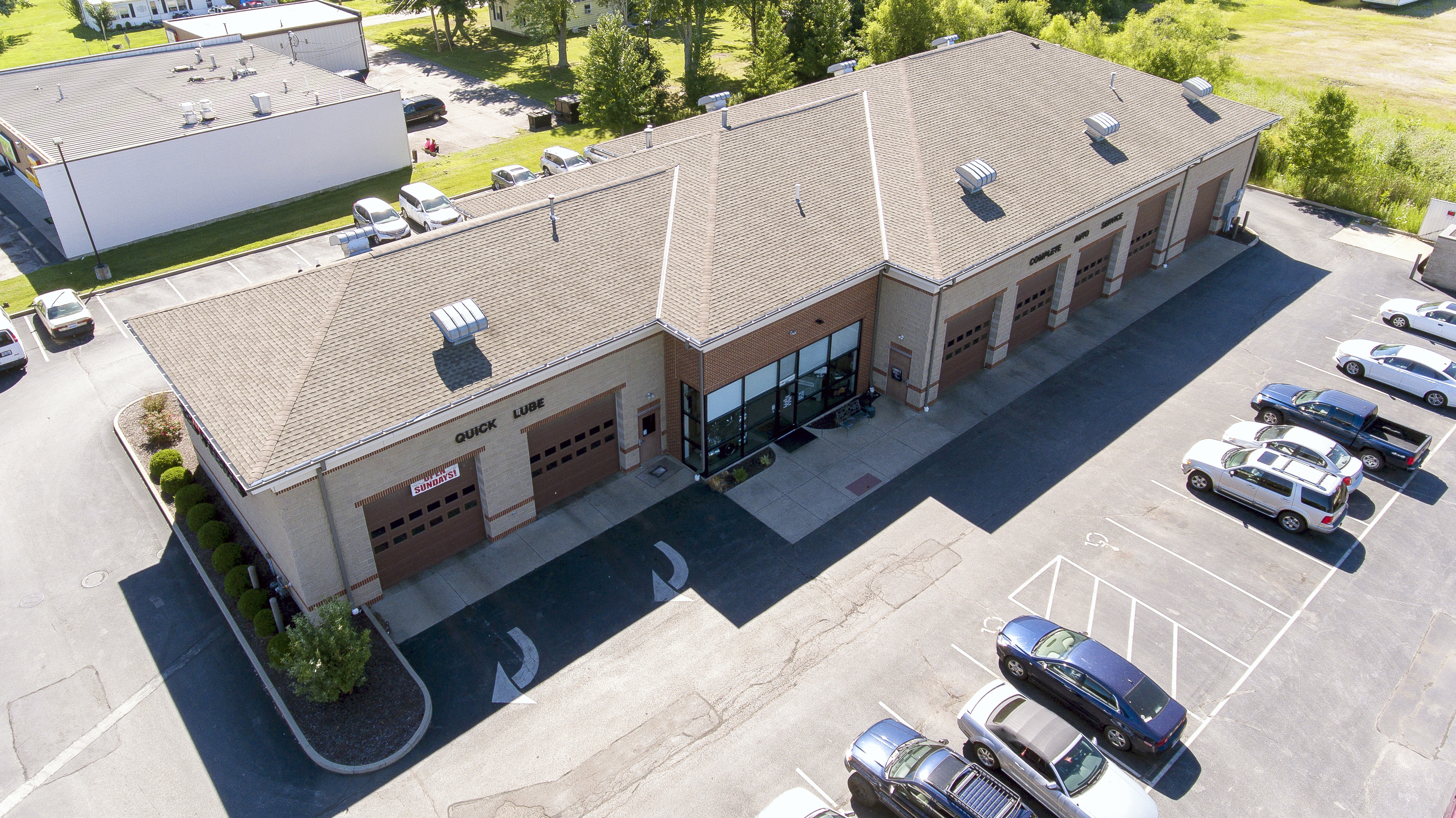 Four Springs Capital Trust Buys Two Automotive Service Center Properties